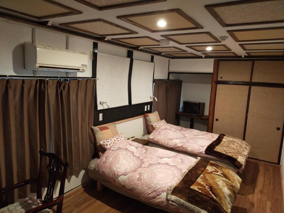 Guest House Neko Neko تويوناكا المظهر الخارجي الصورة