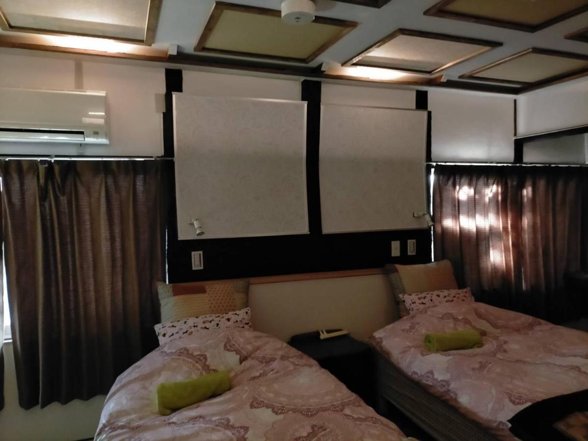 Guest House Neko Neko تويوناكا المظهر الخارجي الصورة