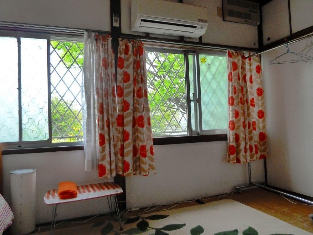 Guest House Neko Neko تويوناكا المظهر الخارجي الصورة